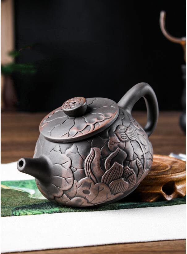 Black Cross Beauty Kettle for a Timeless Tea Ritual